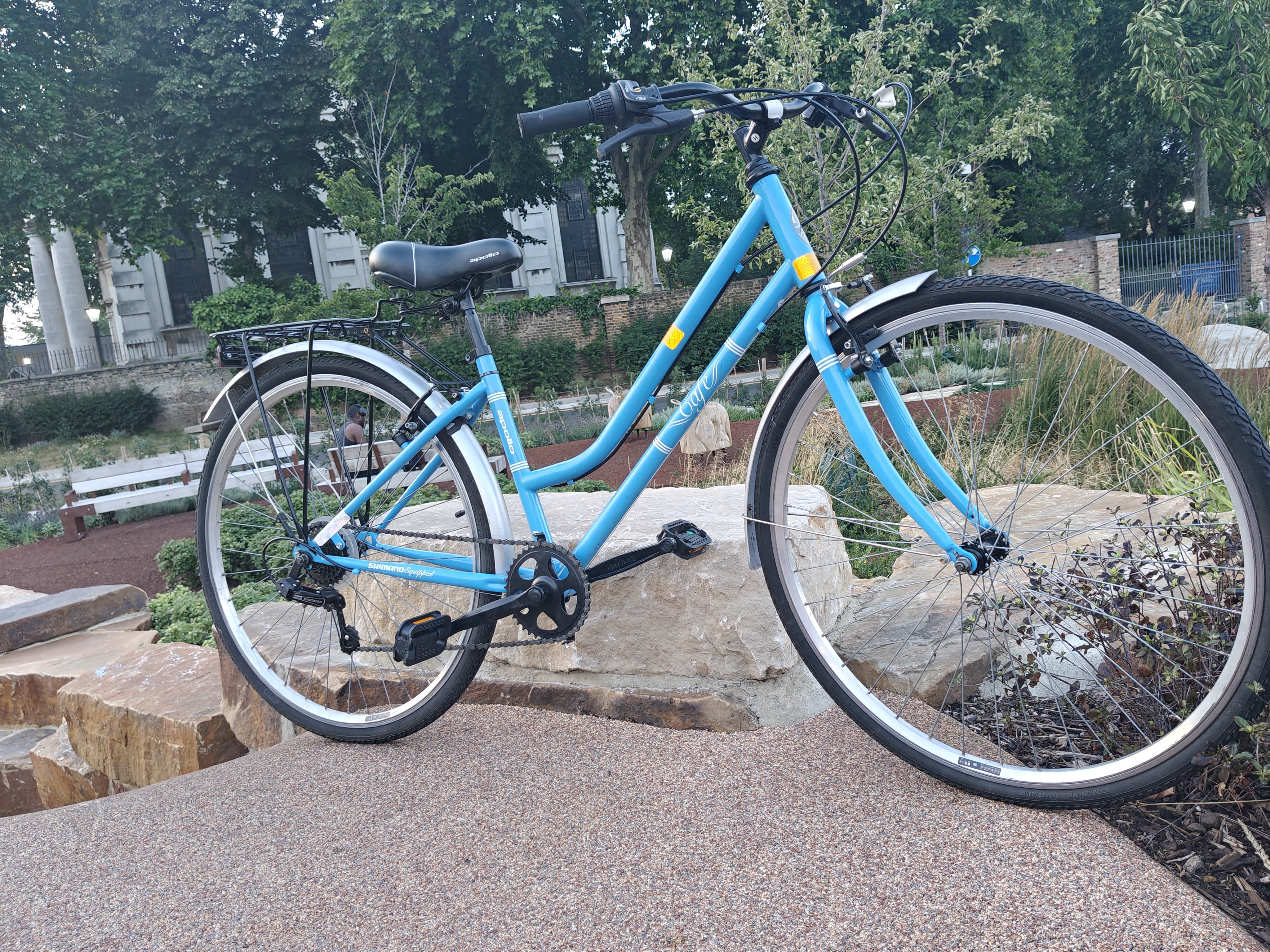 Apollo blue urban city bike rental - comfortable, equipped, and ready to ride