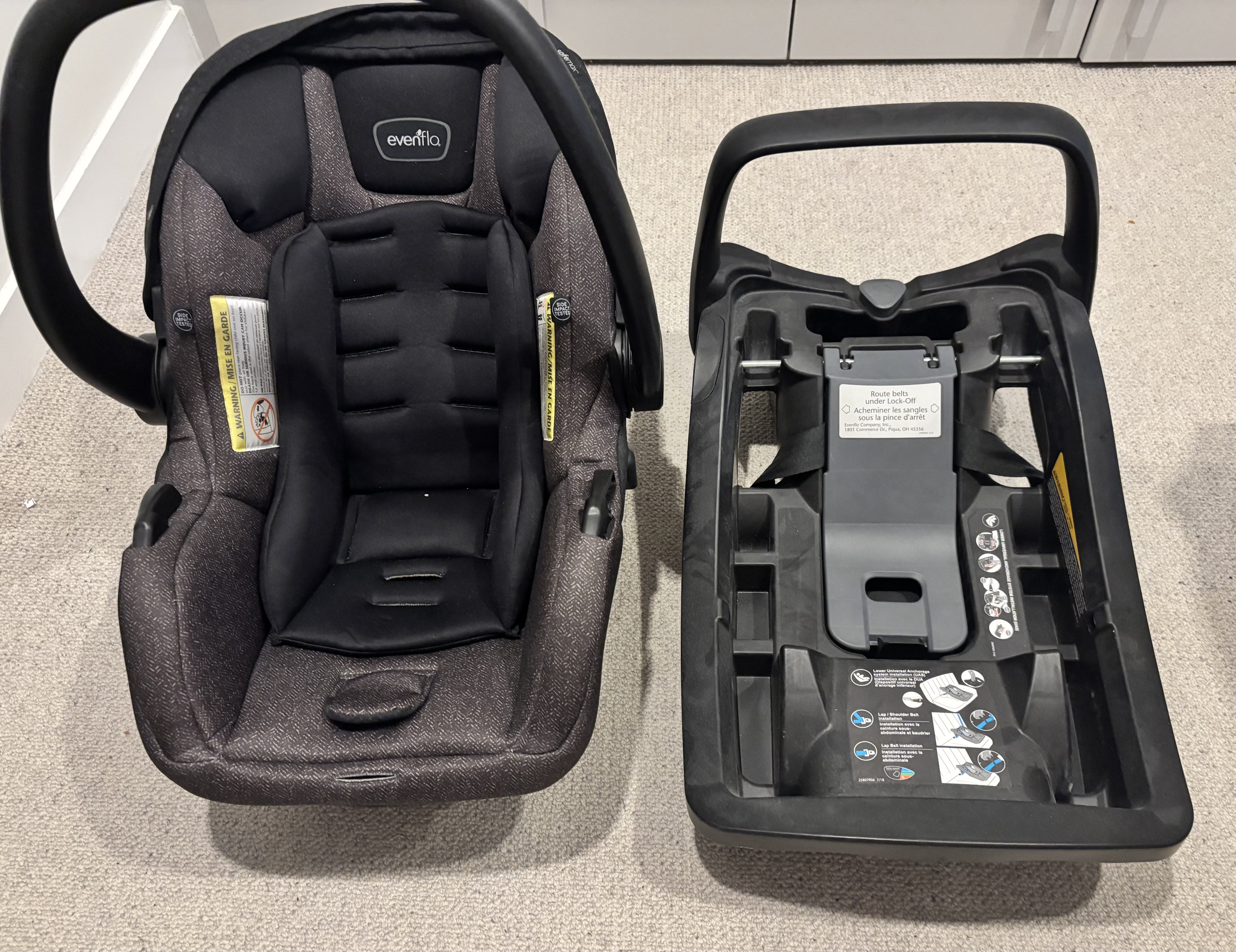 Never used evenflo infant car seat with base - ideal for travel / visitors