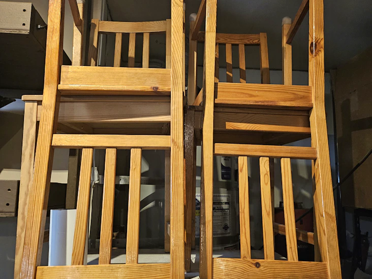 Five lightweight wooden chairs