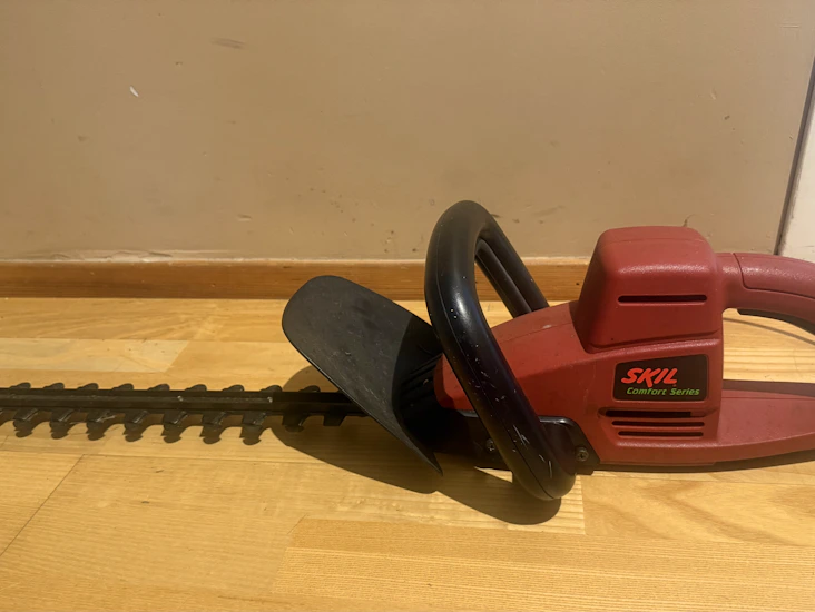 Hekksaks med lang skjøteledning