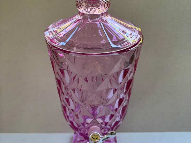 Pink glass jeweled caraf with pour spout & lid