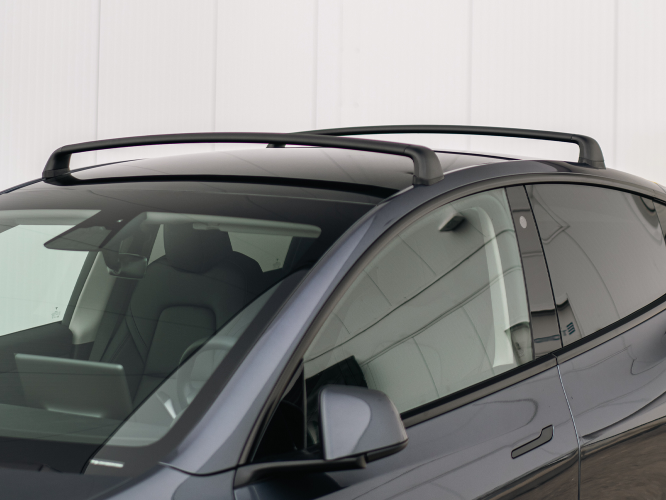 Tesla model y takstativ