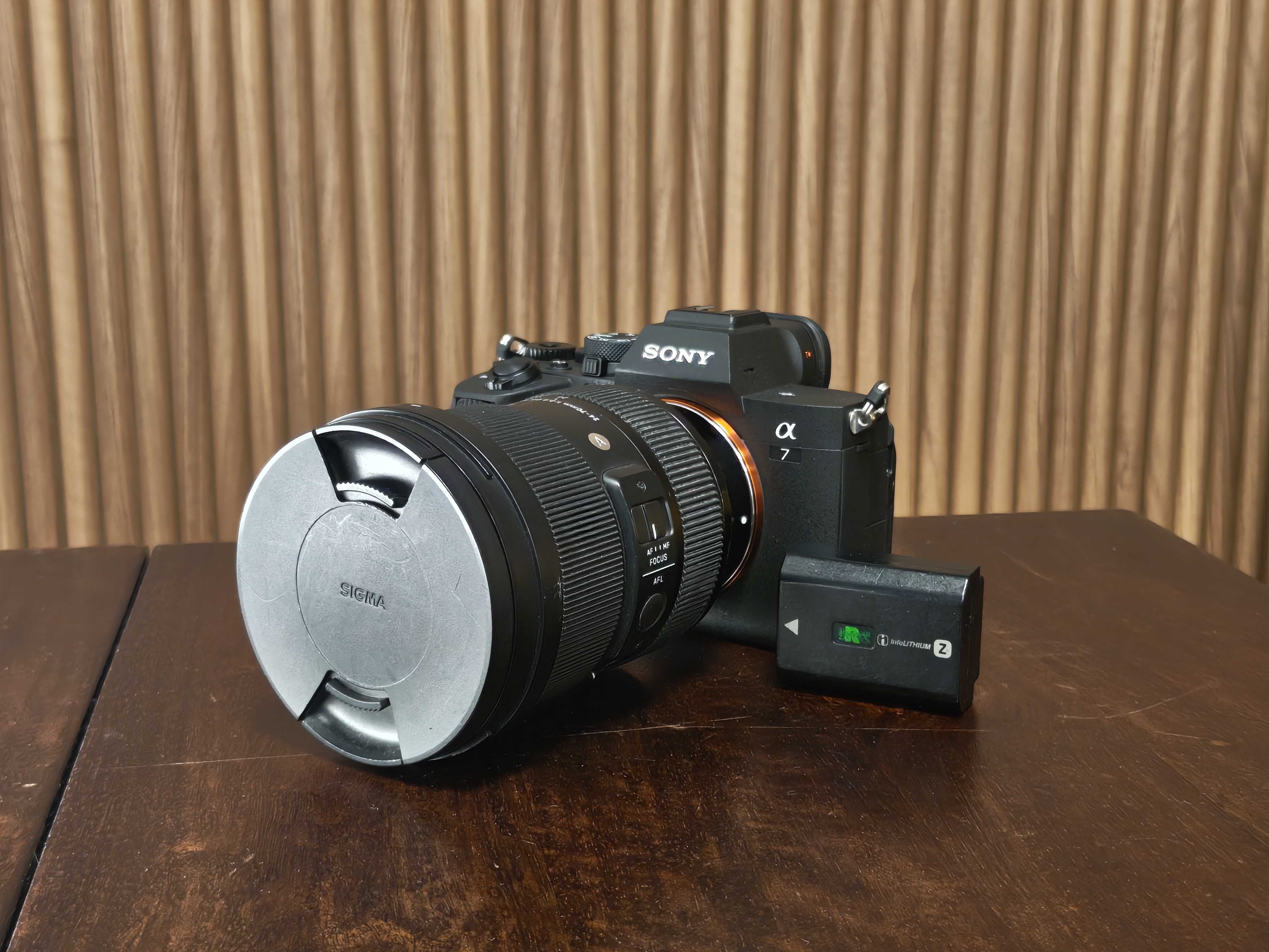 Sony a7iv camera body with battery and lens