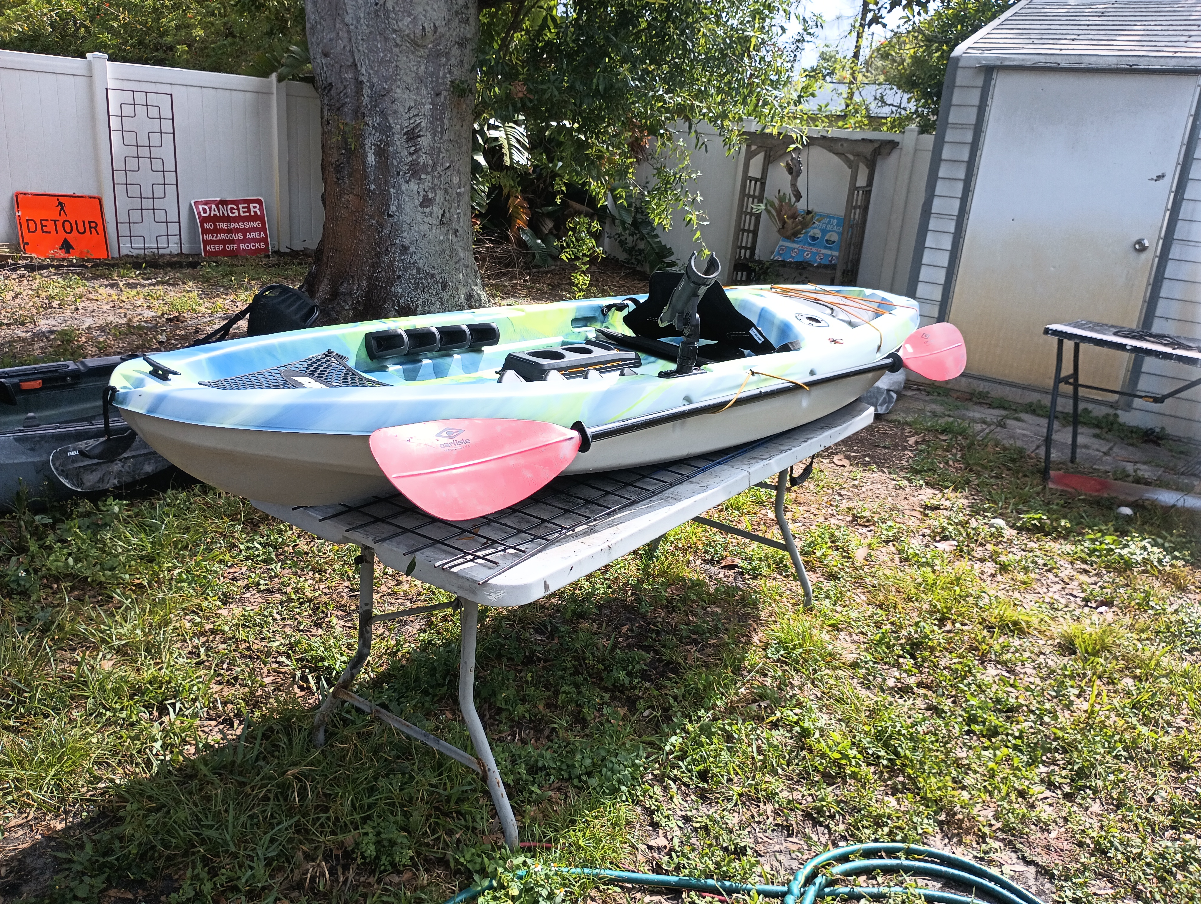 Pelican 10 ft fishing kayak.