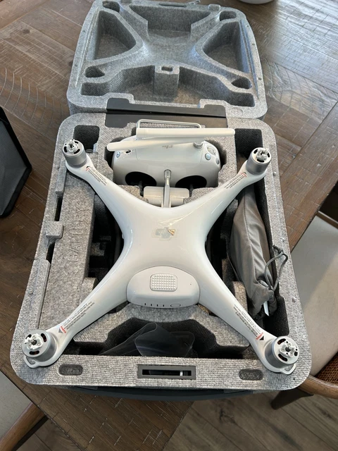 Dji phantom 4 pro drone, camera, full case, batteries, charger, spare blades