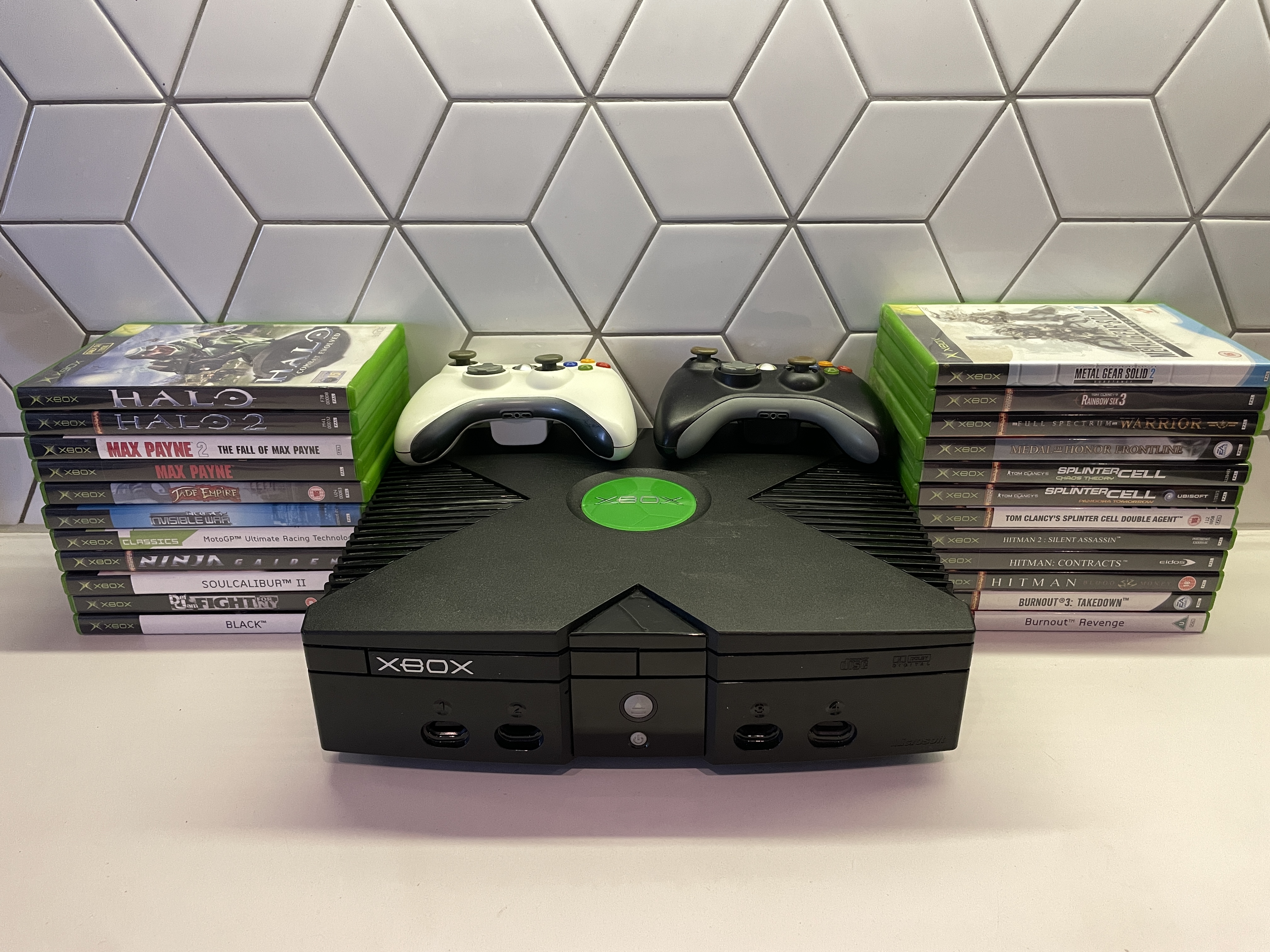 Original x-box console, x2 wireless controllers and x23 games complete with cases + manuals 