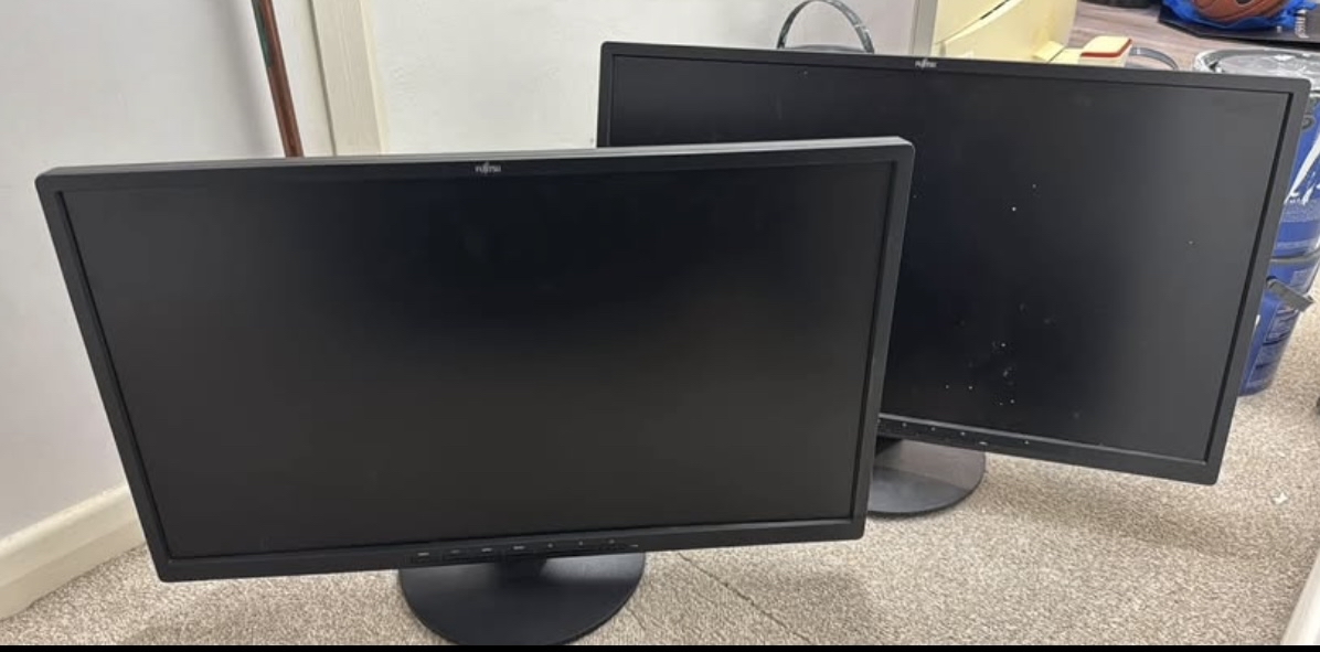 Two pc monitor screens