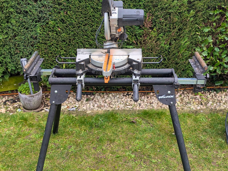 Evolution doubel bevel mitre saw with stand