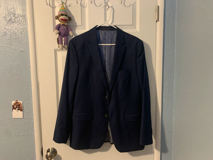 Beautiful cobalt blue performance suit for rent from friar tux