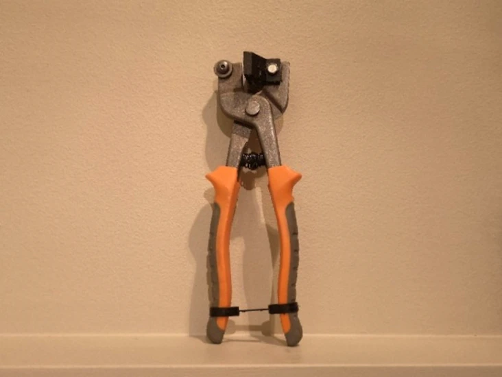 Handhållen kakelskärare