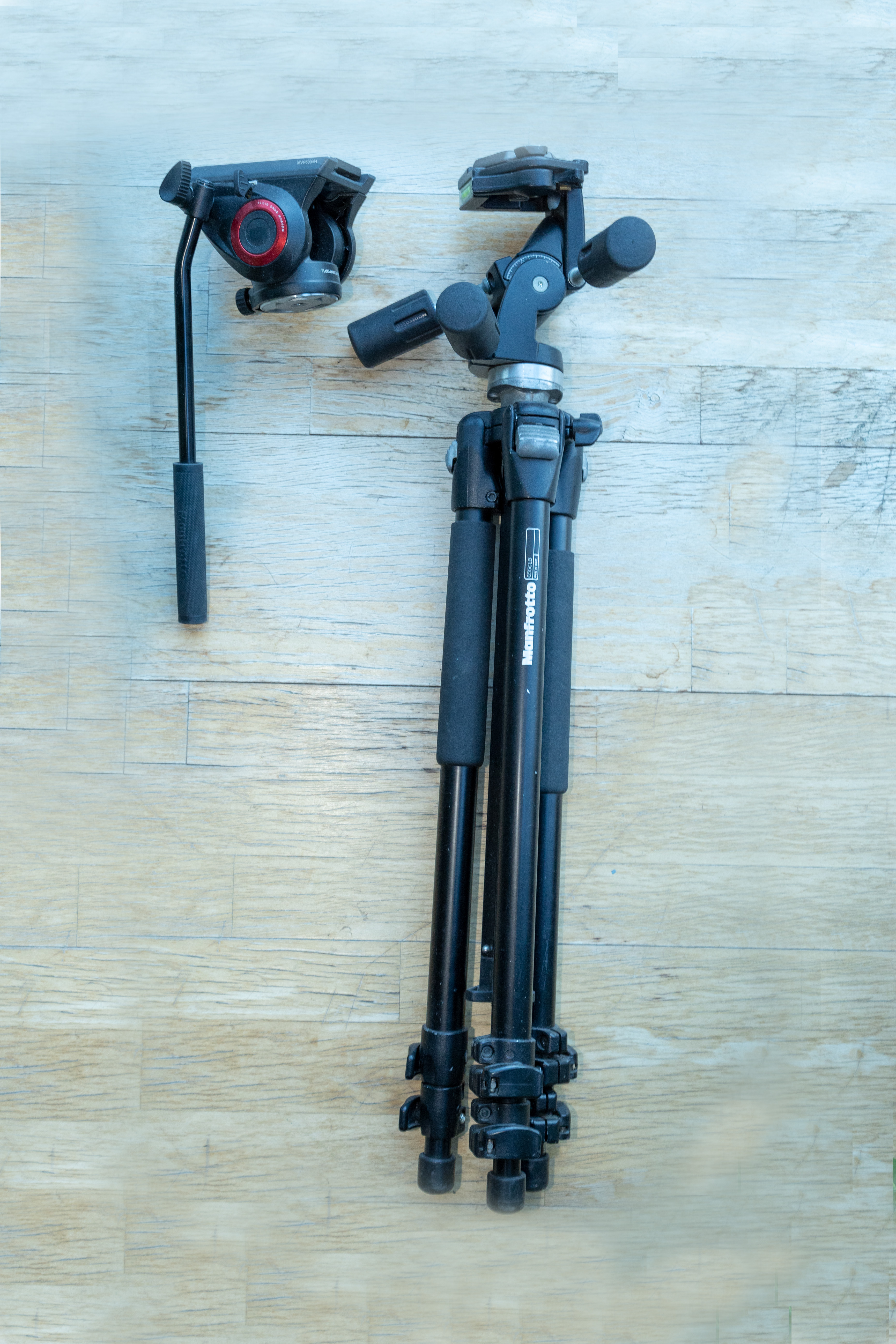 Manfrotto  tripod 055clb with photo or video fluid head