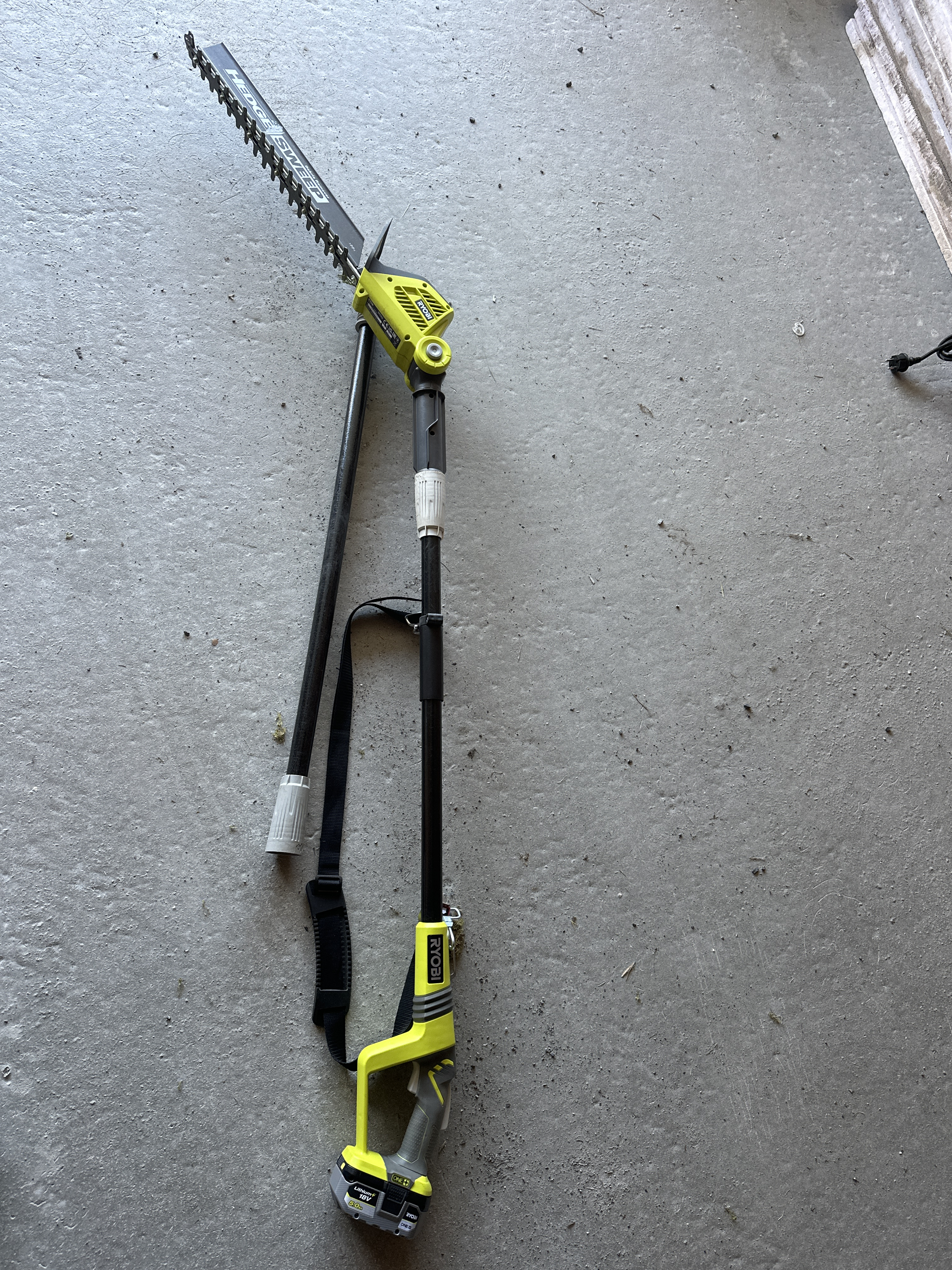 Lang ryobi hekkesaks 18v