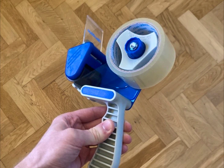 Tejphållare för packtejp