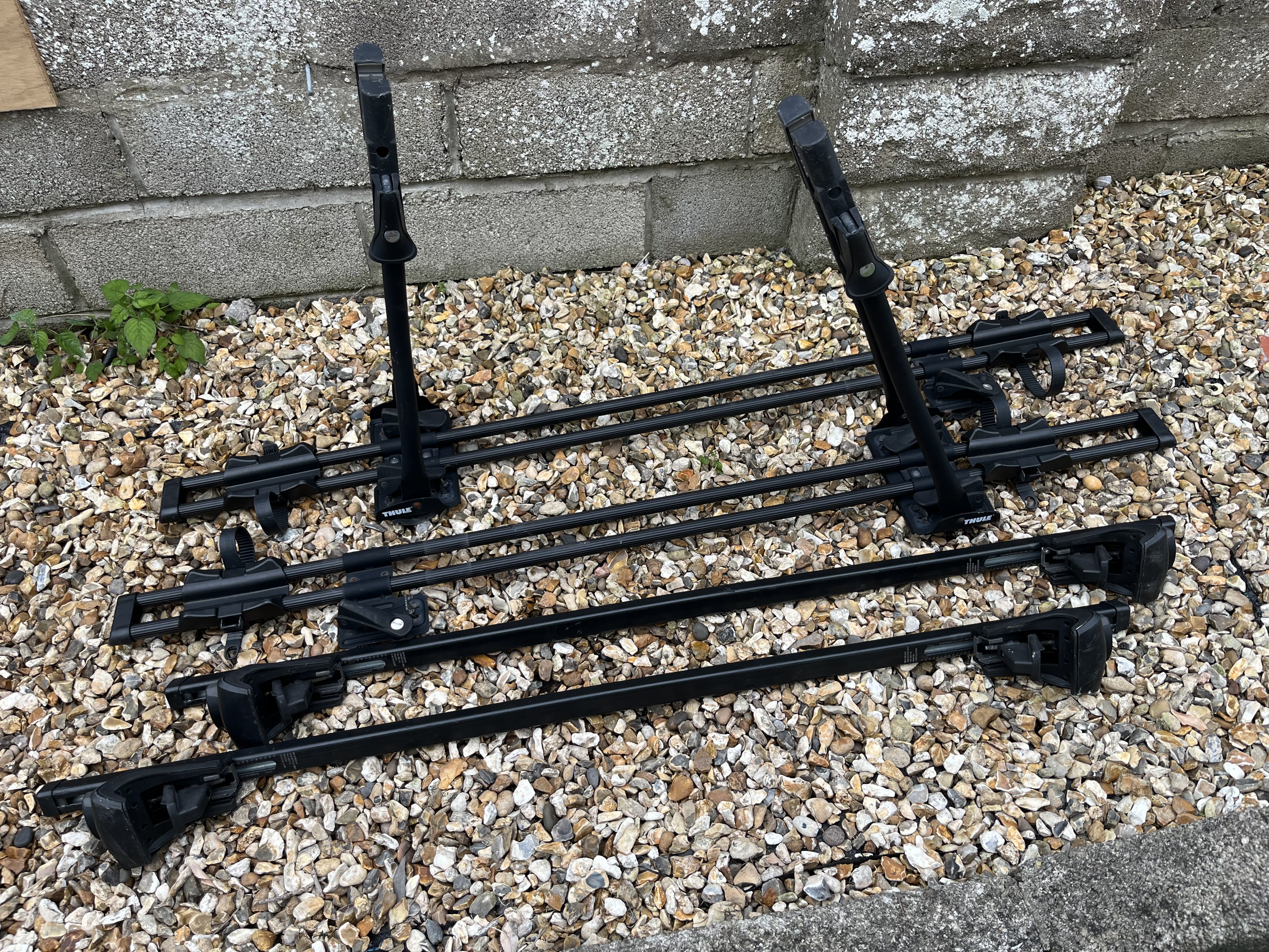 2 x thule 530 bike carriers with roof rack for raised roof rails