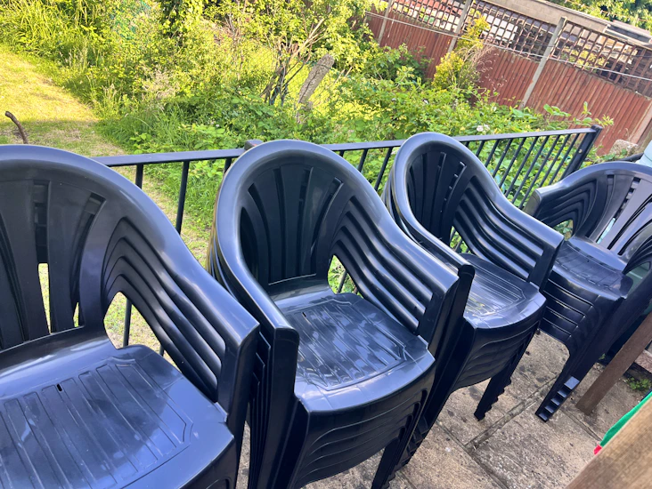 Black stackable garden chairs x 20