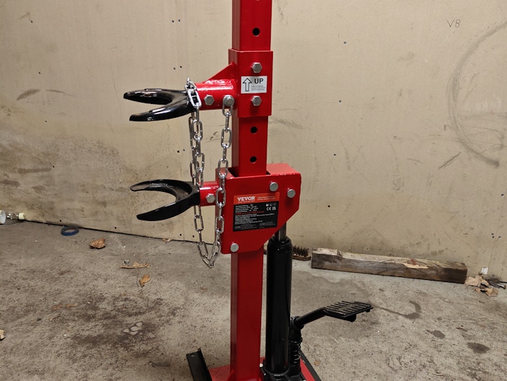 Fjäderspännare för fjäderben mcpherson