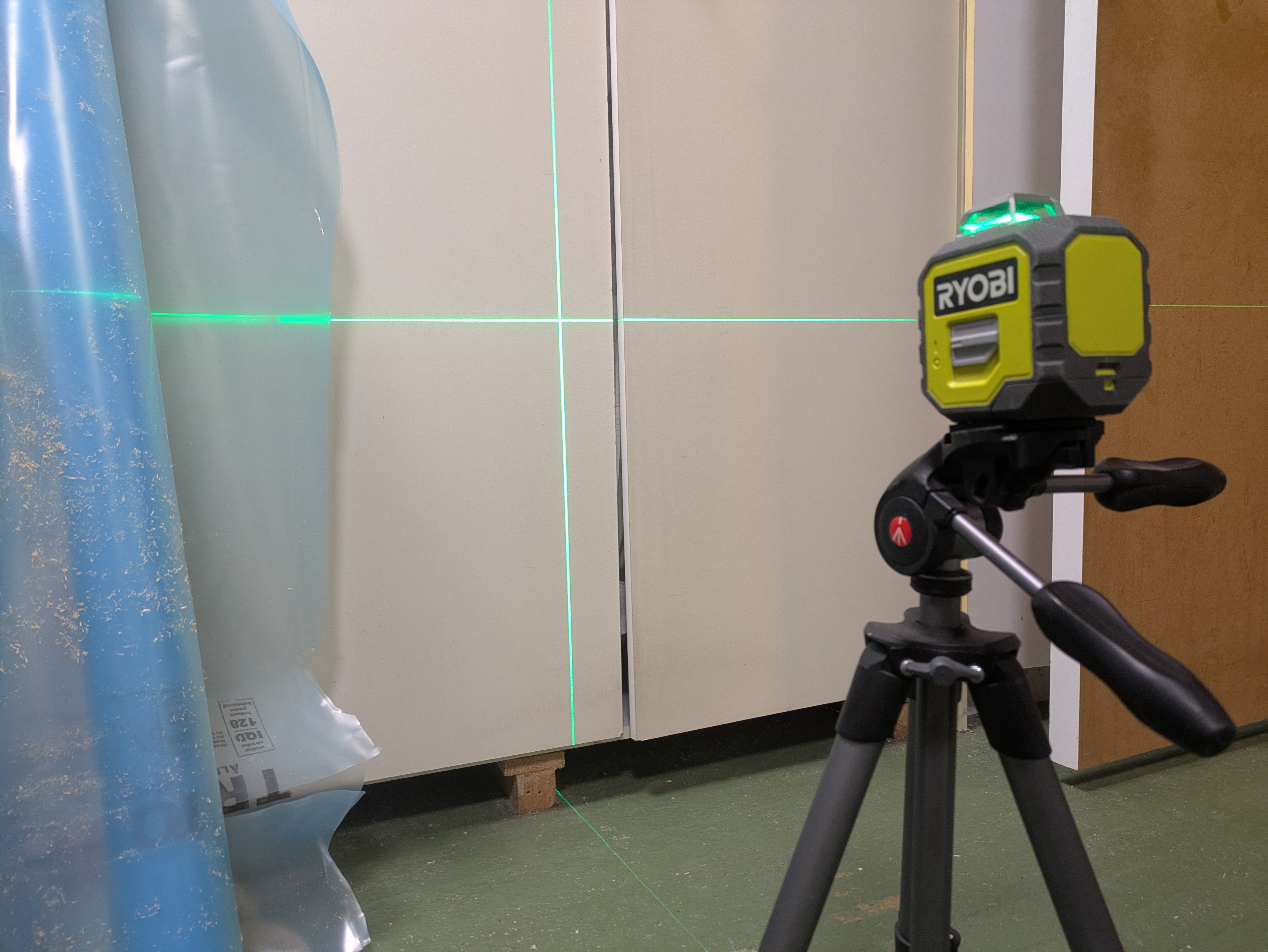 Ryobi linjelaser/krysslaser med stativ 