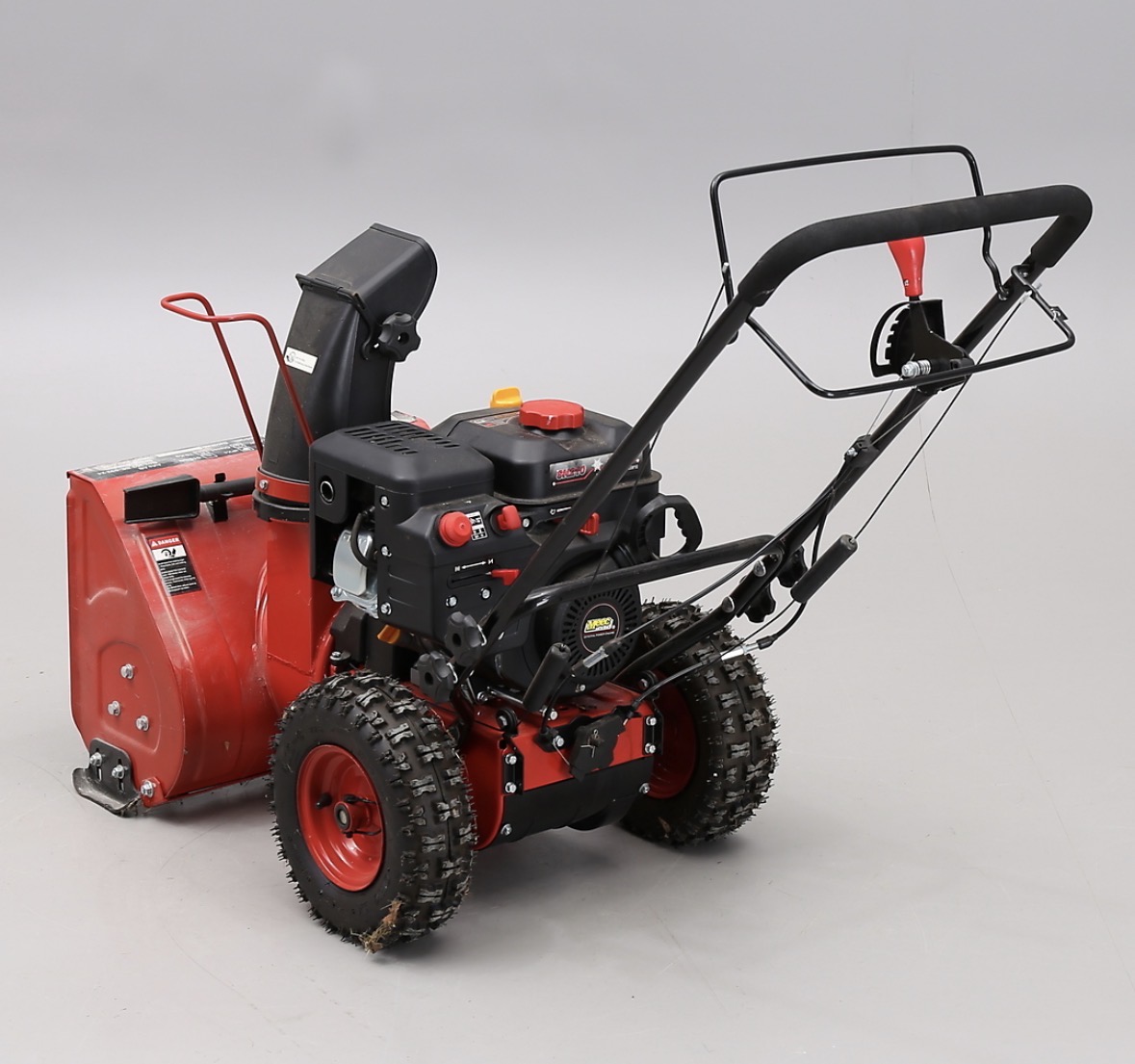 Bensindriven snöslunga 