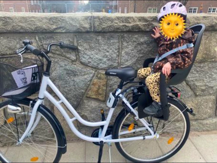 Damcykel med barnsits