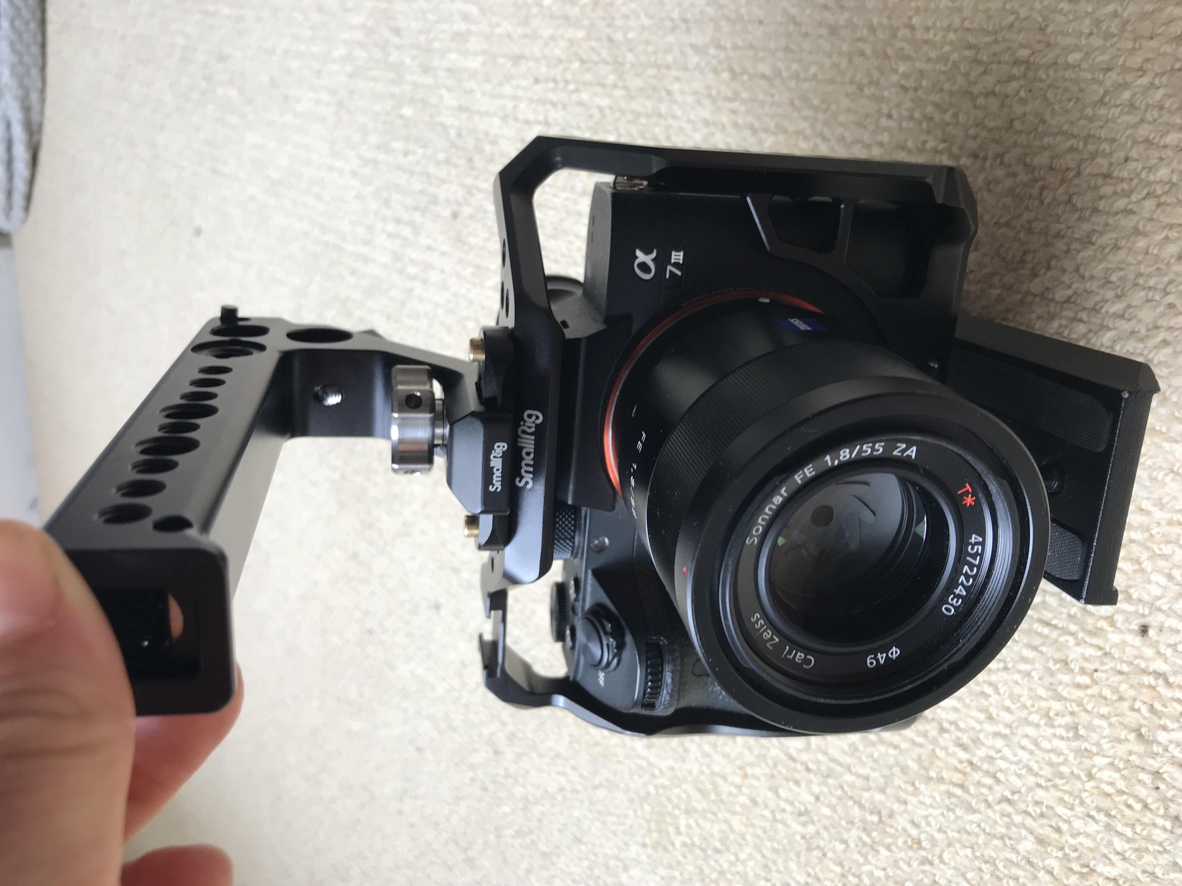 Sony a7iii + small rig cage + zeiss 55mm lens 