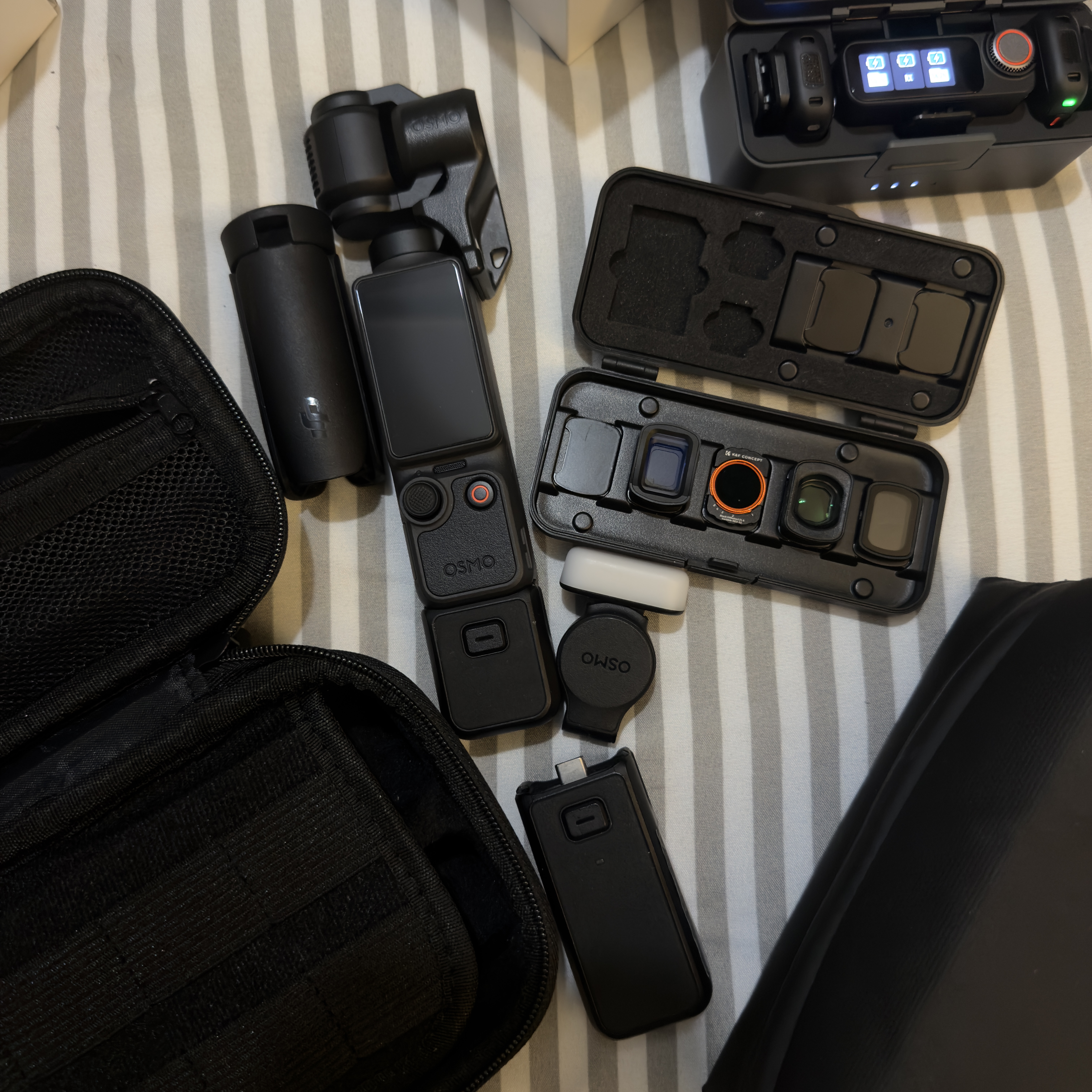 Dji osmo pocket 4 creator kit + dual wireless mics & filters