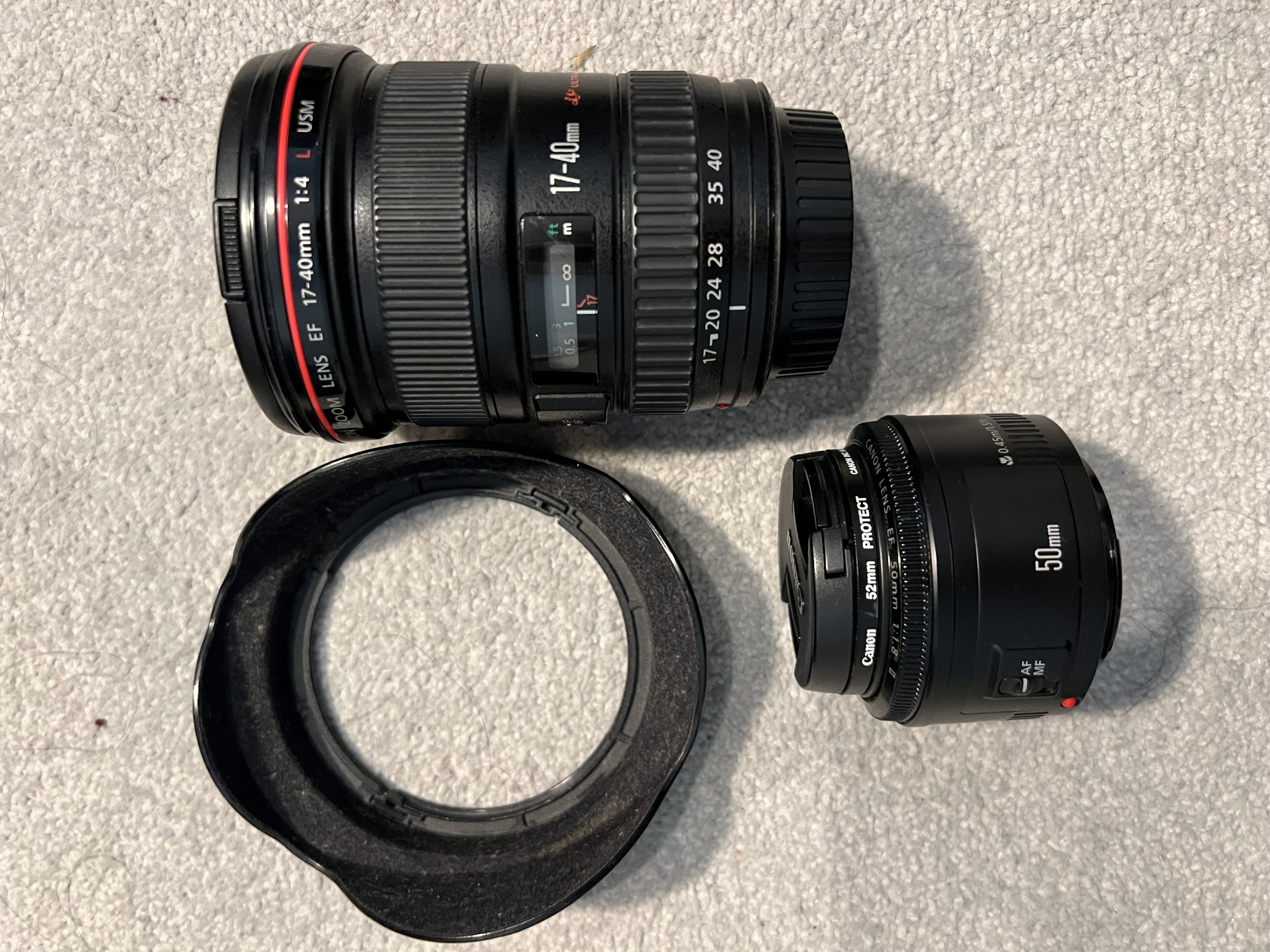 17-40 mm cannon and 50 mm lens
