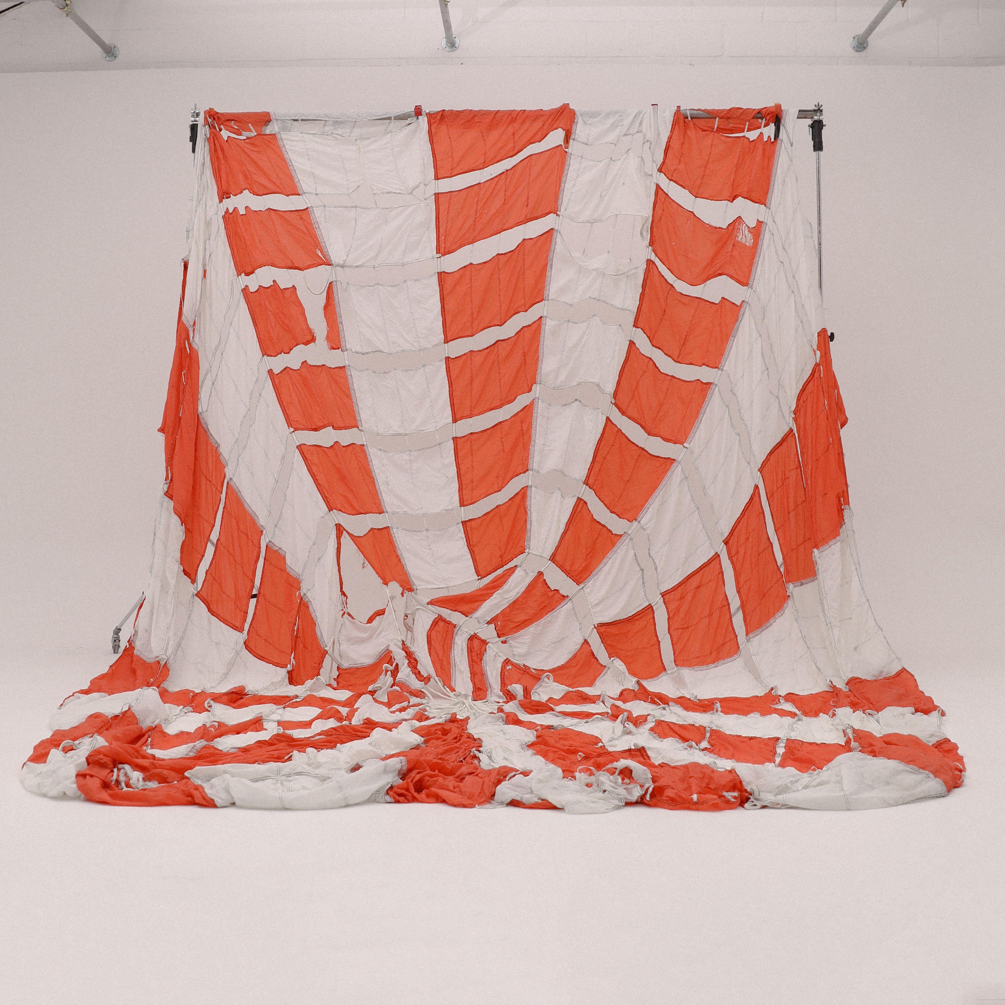 Orange and white parachute 