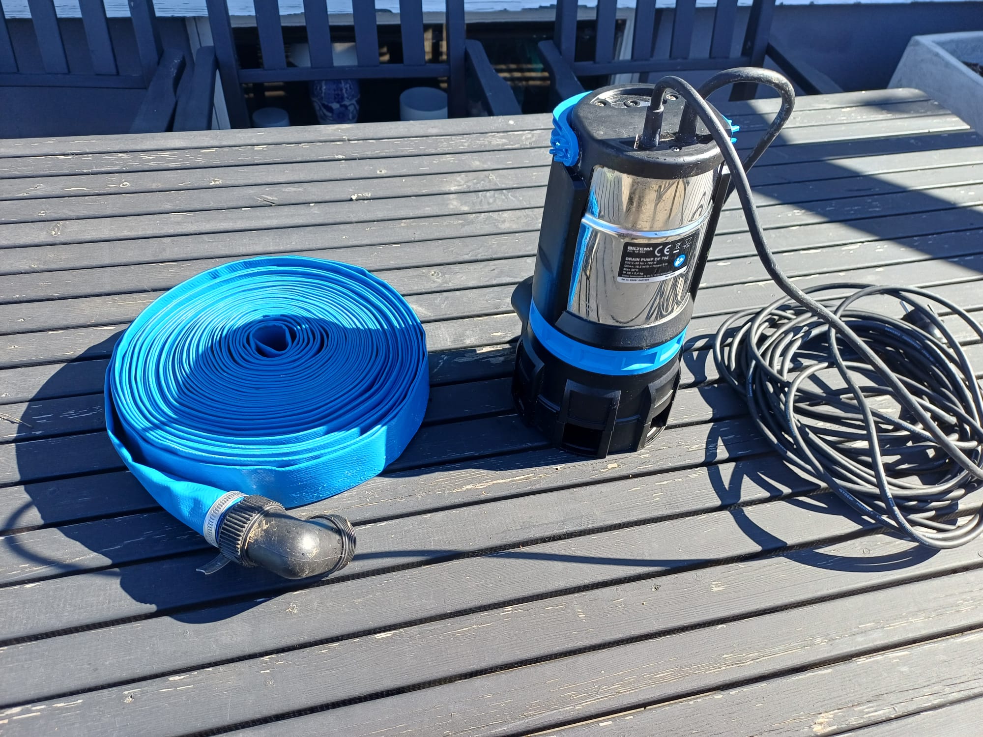 Dränerings pump med slang