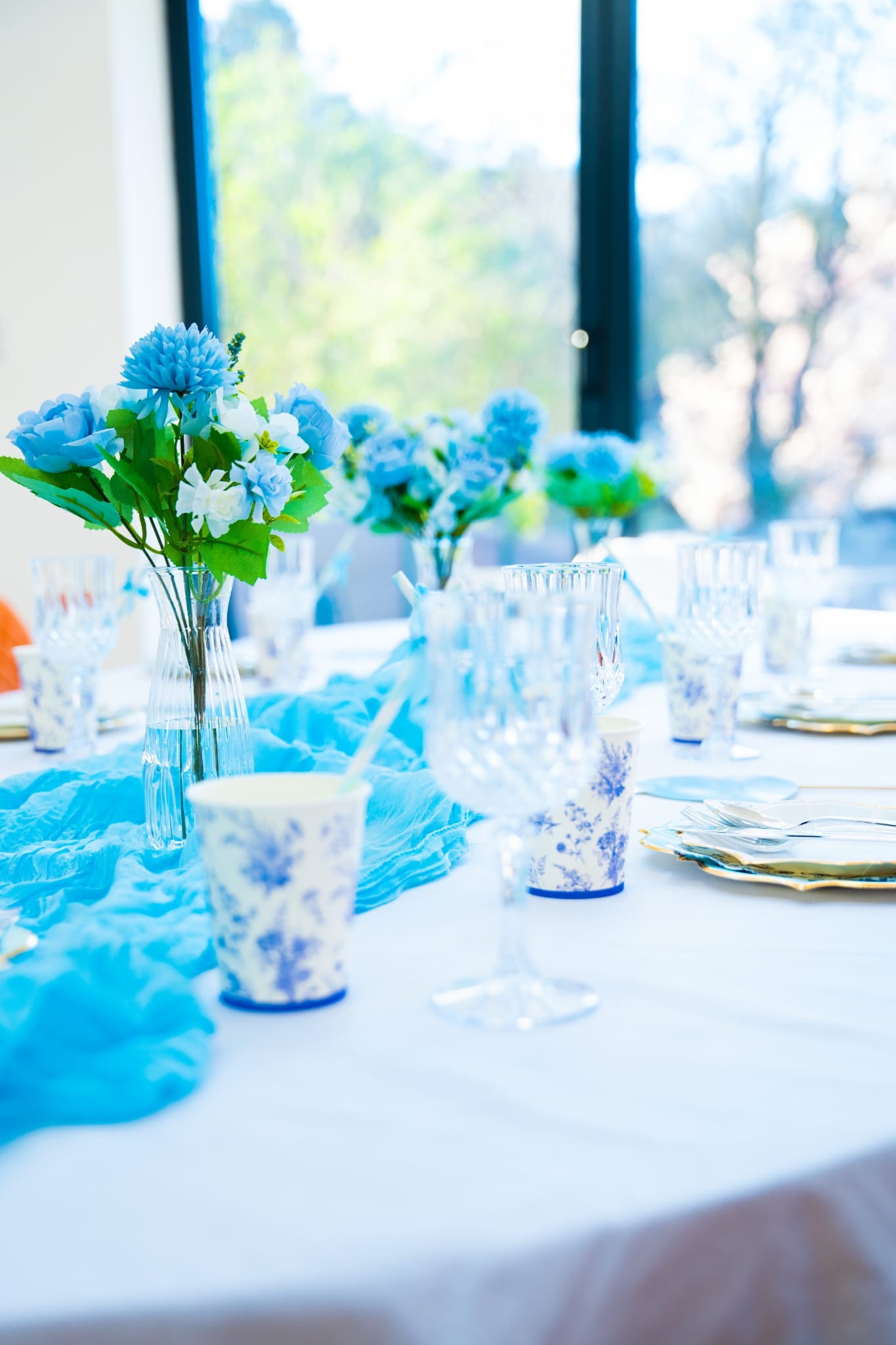 Blue flowers with plastic vase (3 available ) 