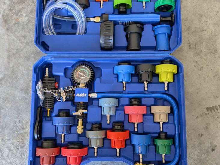 Cooling system compression tester, cooling system pressure tester