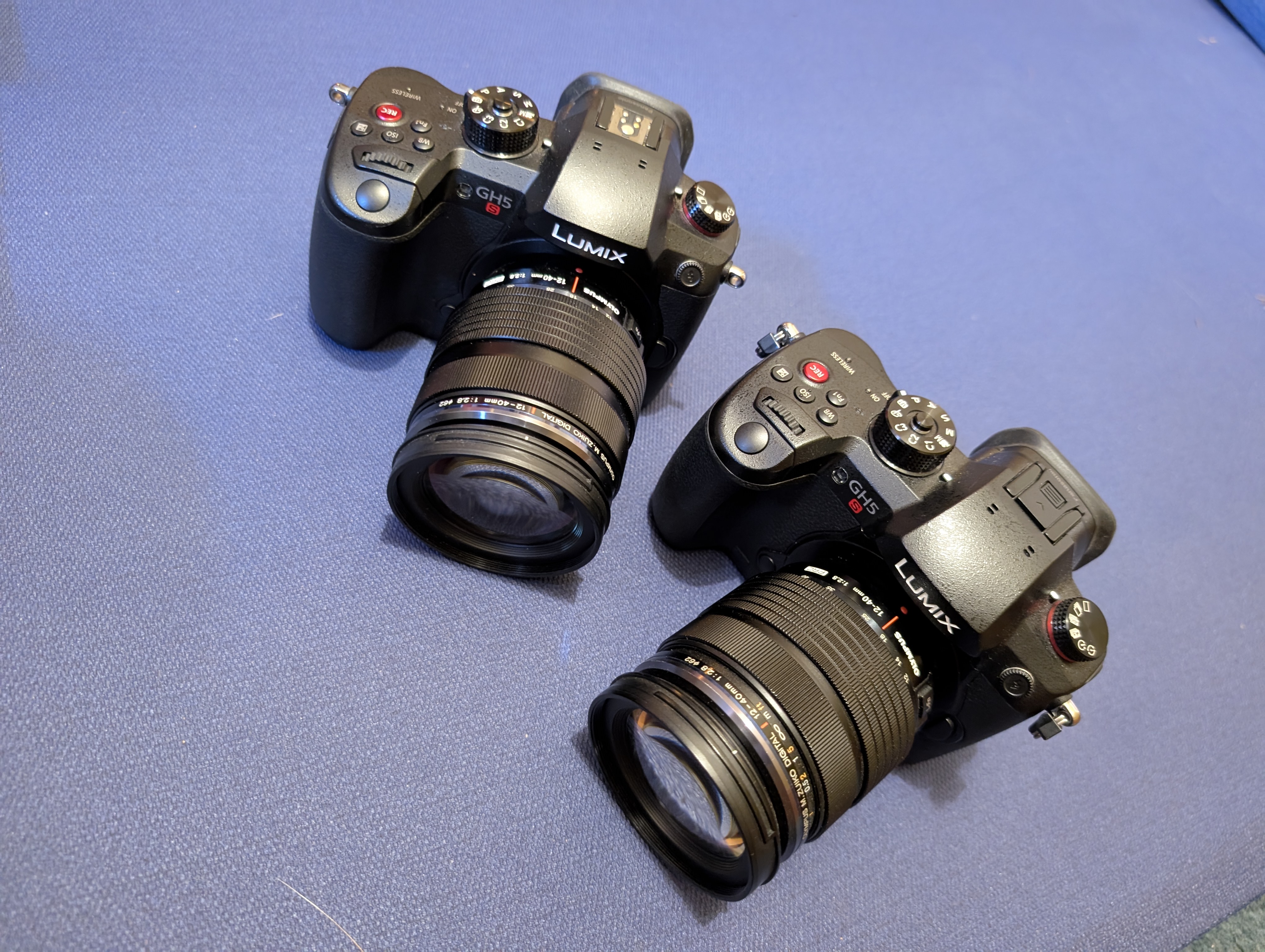 2 x panasonic gh5s + 2 x olympus 12-40mm lenses, with 4 x batteries, 4 x memory cards, 2 chargers.