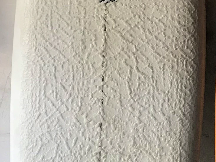 6'0" tim stamps surfboard