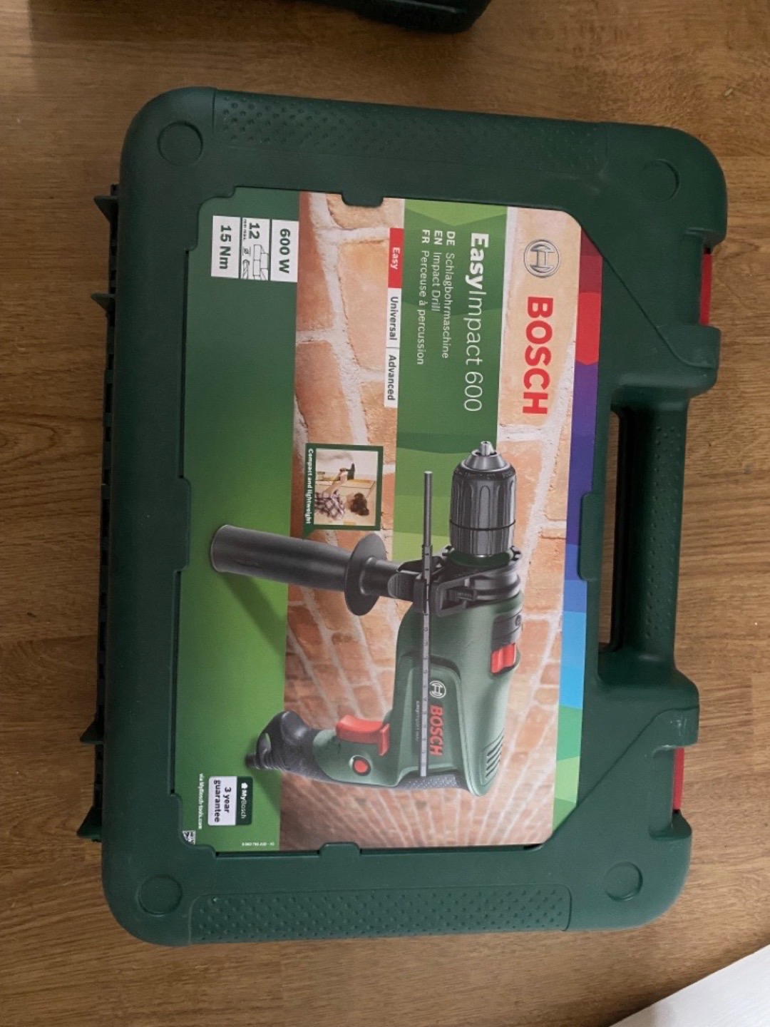 Slagborrmaskin samt borr- och bitssats 