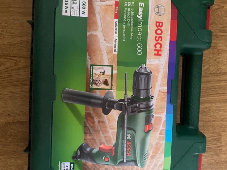 Slagborrmaskin samt borr- och bitssats