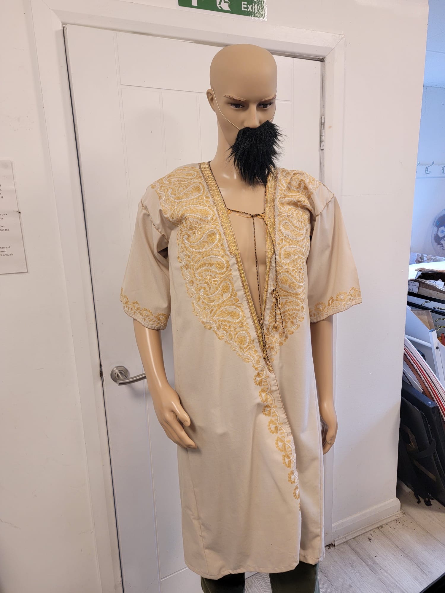 White gown with gold applications