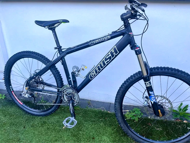 Orange crush mountain bike hire – 18" frame | fox 130mm fork | sram 27-speed | avid hydraulic brakes | new milton / new forest