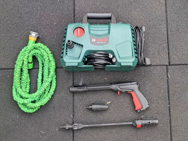 Bosch pressure washer with hose and tap connector. patio cleaner and pressure washer rental. perfect for outdoor cleaning