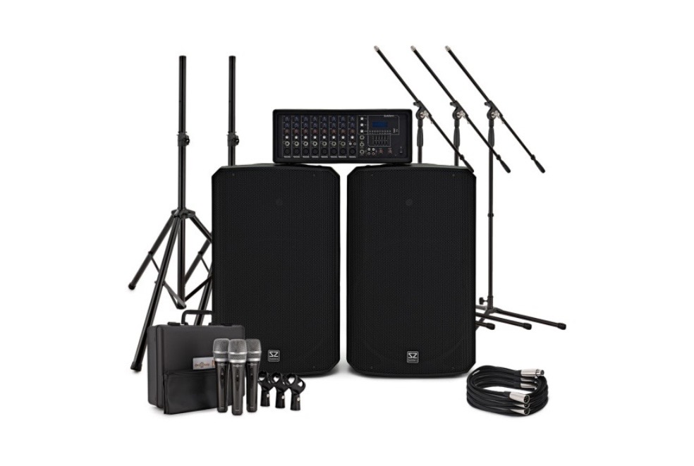 Two large speakers, mixer, multiple mics and amps to plug into 