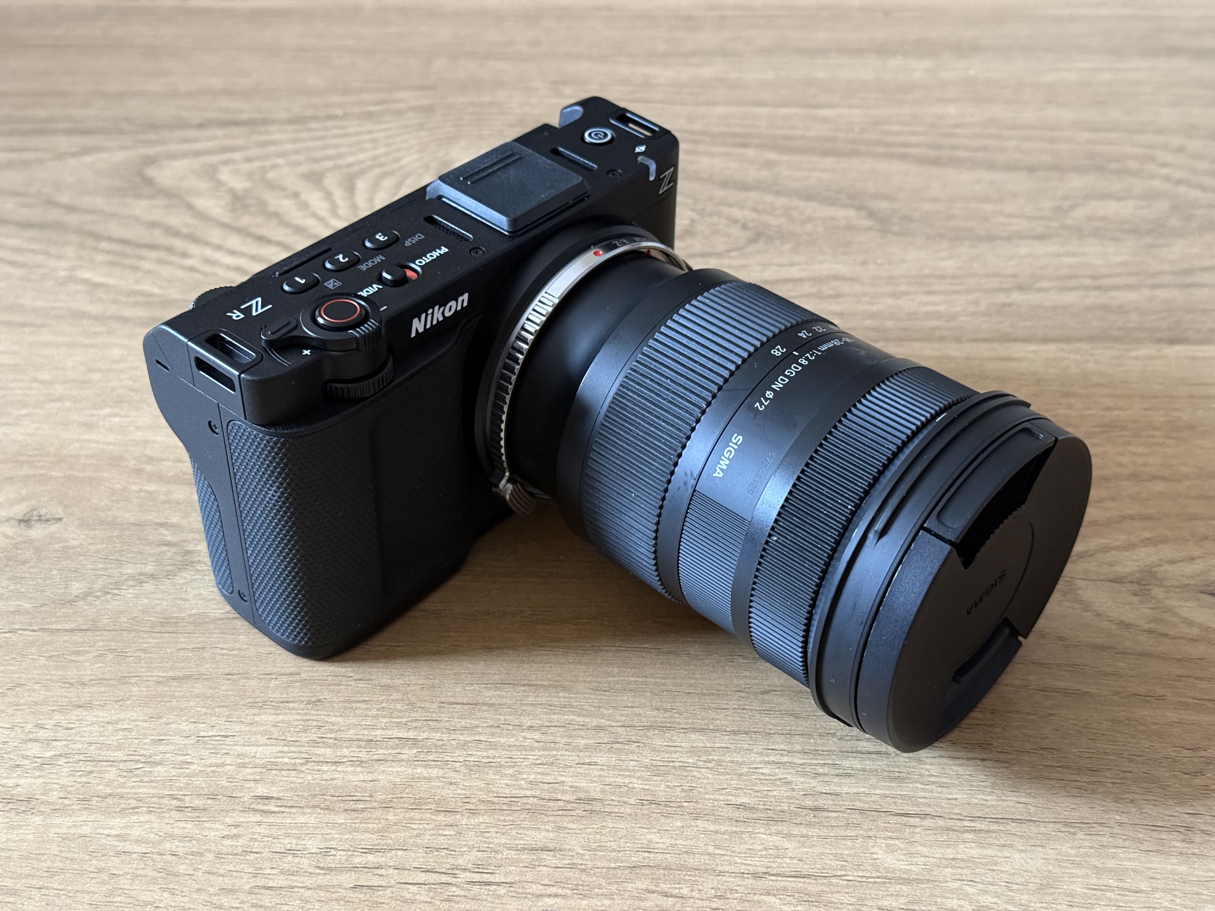 Nikon zr // red raw camera + lens + 1tb memory card + sony e mount adatper bundle