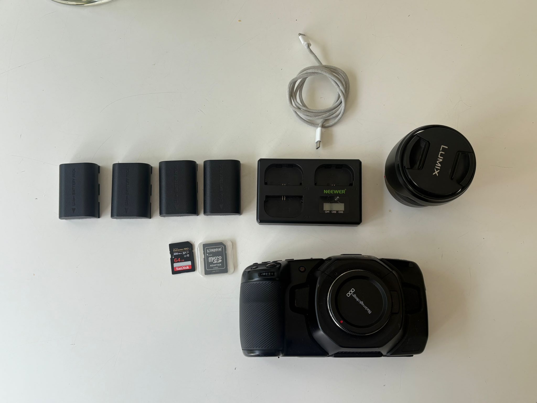 Black magic pocket 4k camera, 12-35mm lens, tripod & battery bundle 