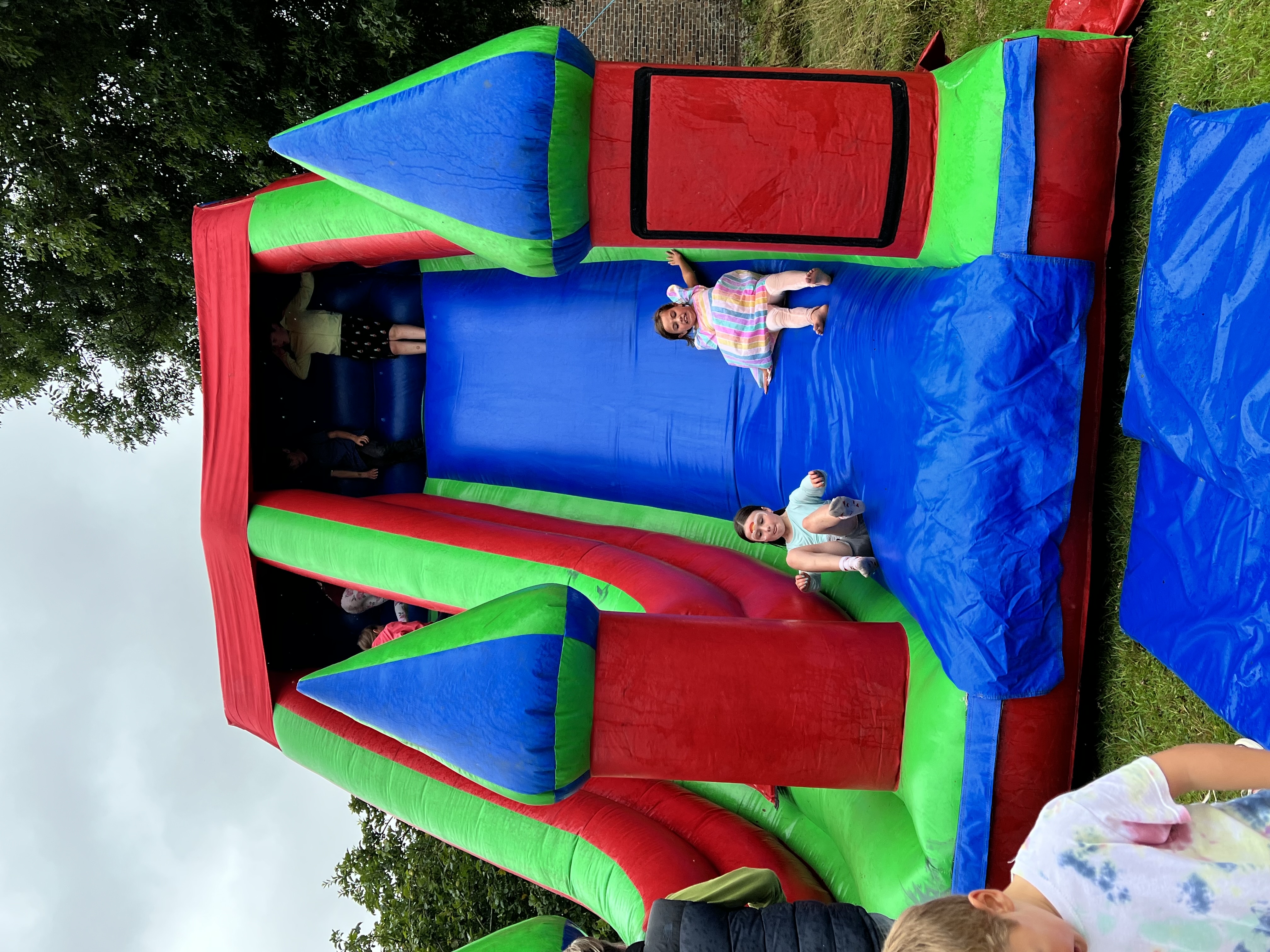 Slide bouncy castle