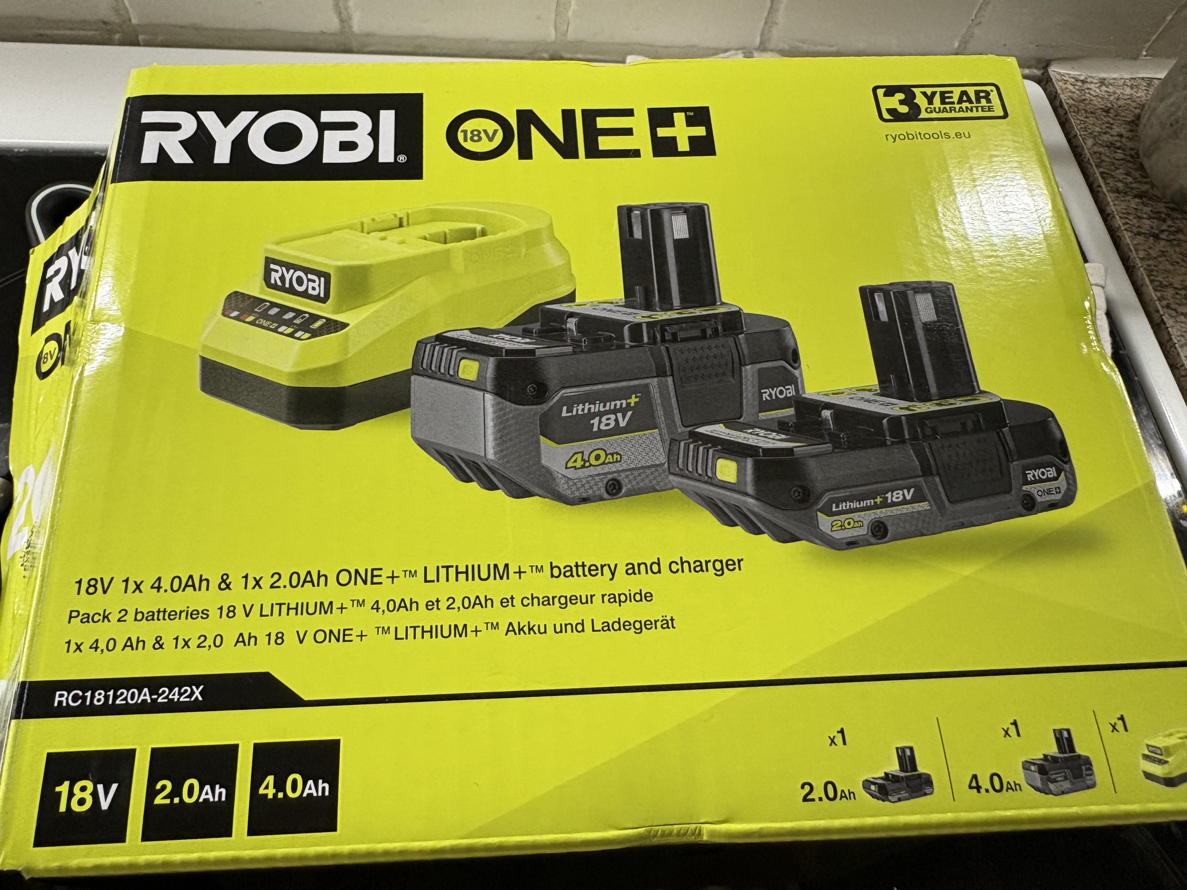 2 ryobi one+ batteries + charger