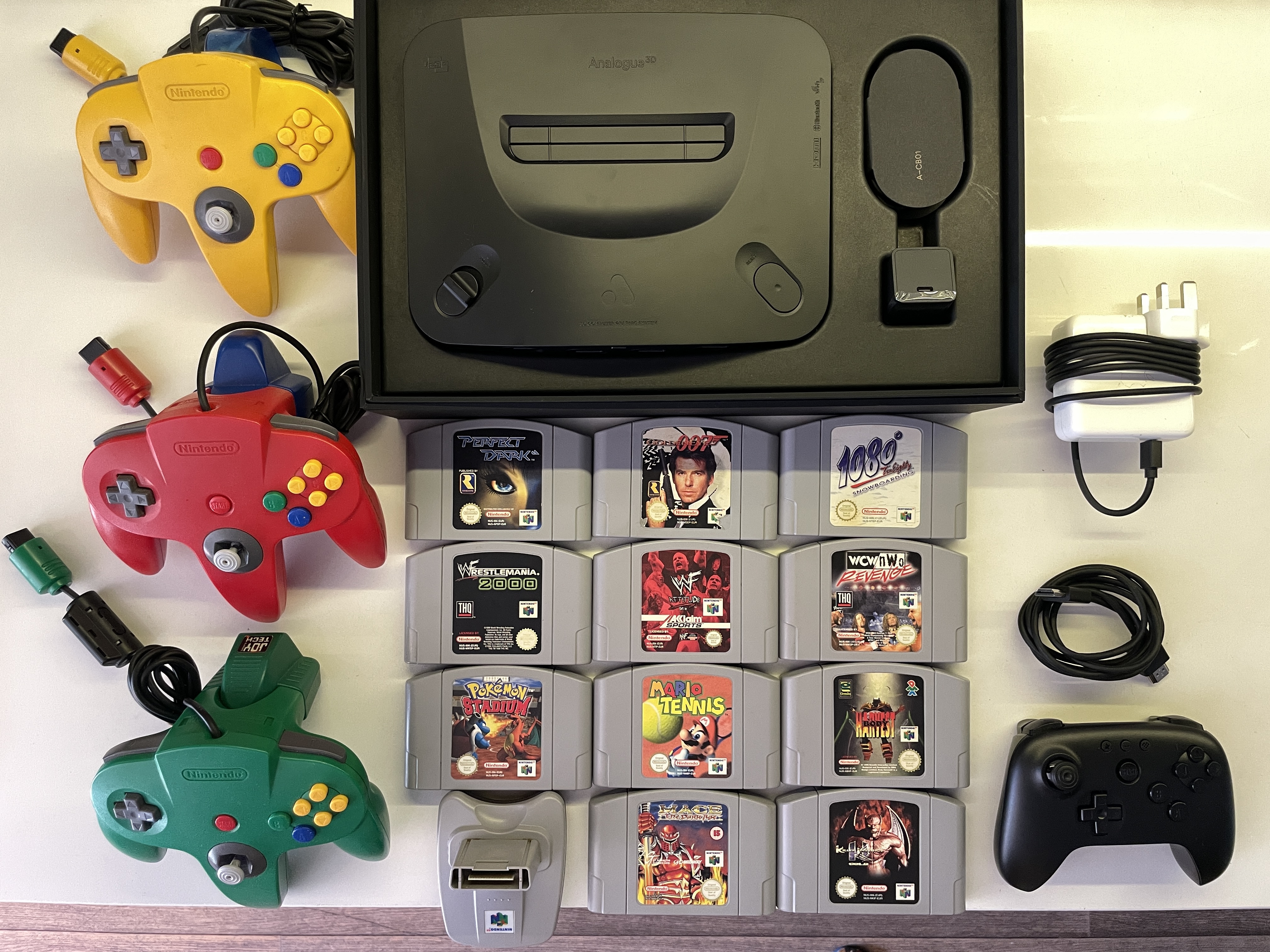 Analogue 3d (plays n64 in 4k on modern tv’s) with x4 controllers & 11 games