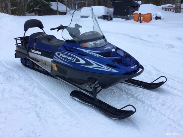 Snøscooter og løypesetter