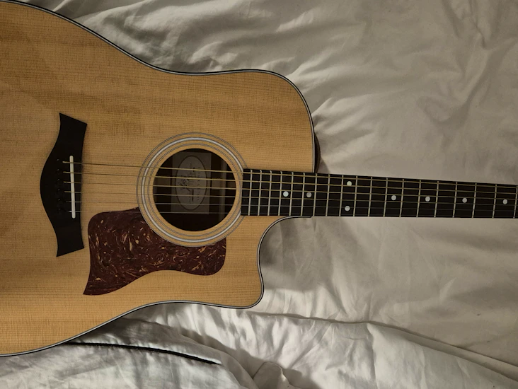 Taylor 310ce electro acoustic guitar