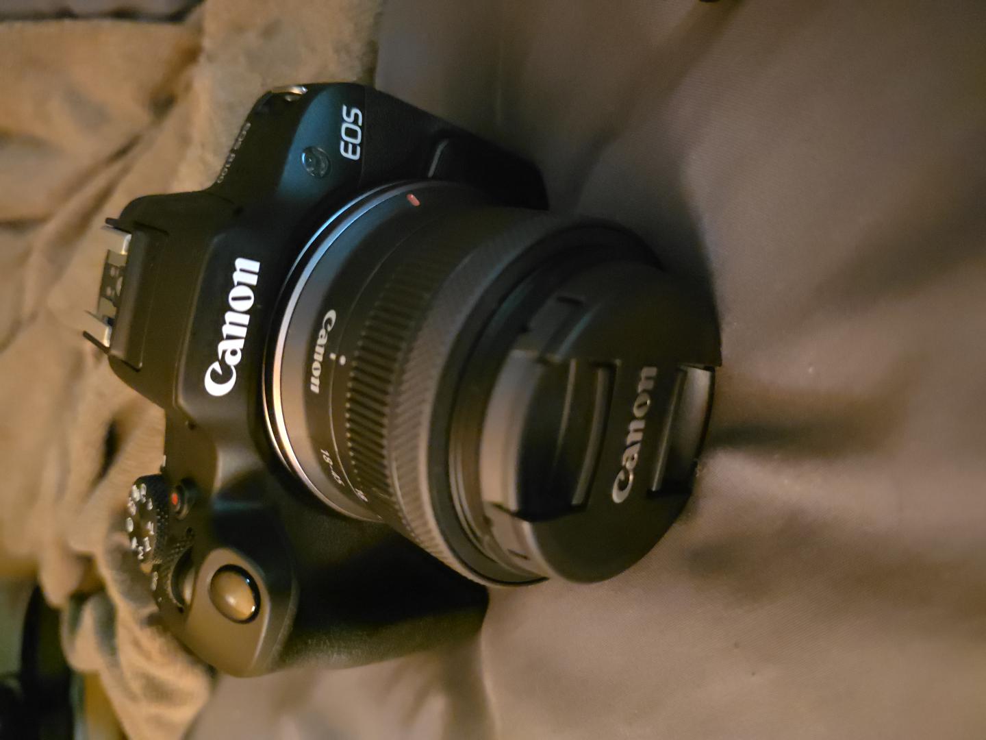 Canon eos r100 mirrorless camera + rf-s 18–45mm lens