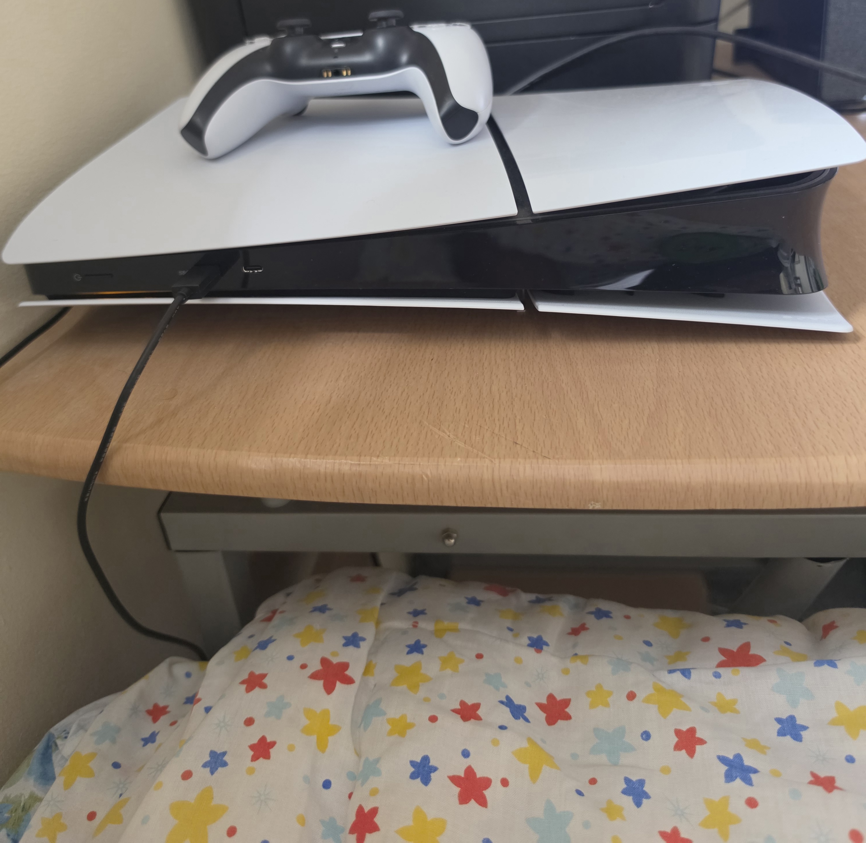 Playstation 5 slim edition with controller.