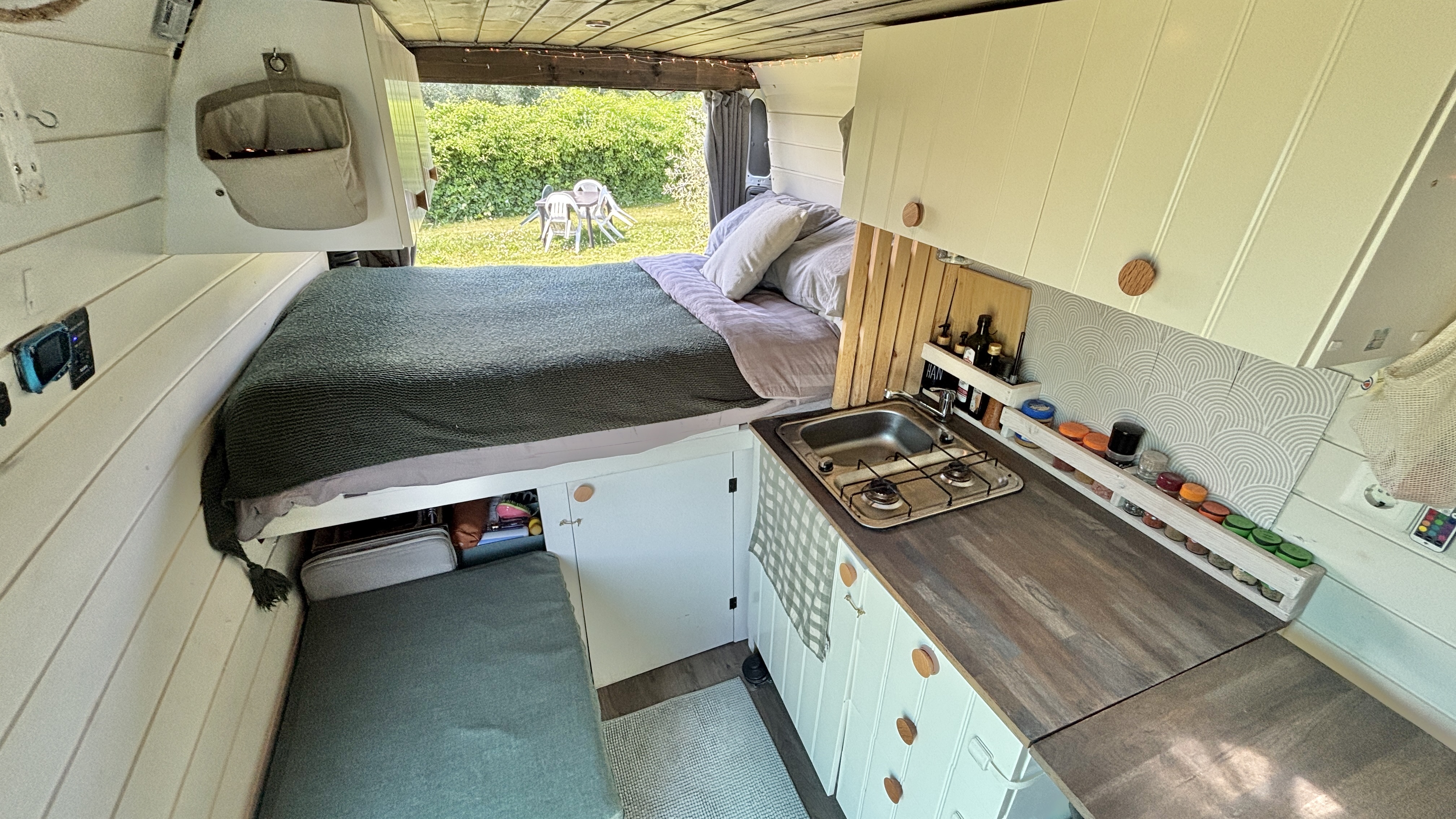 A spacious and comfortable van conversion that’s easy to drive and cozy to live in! 