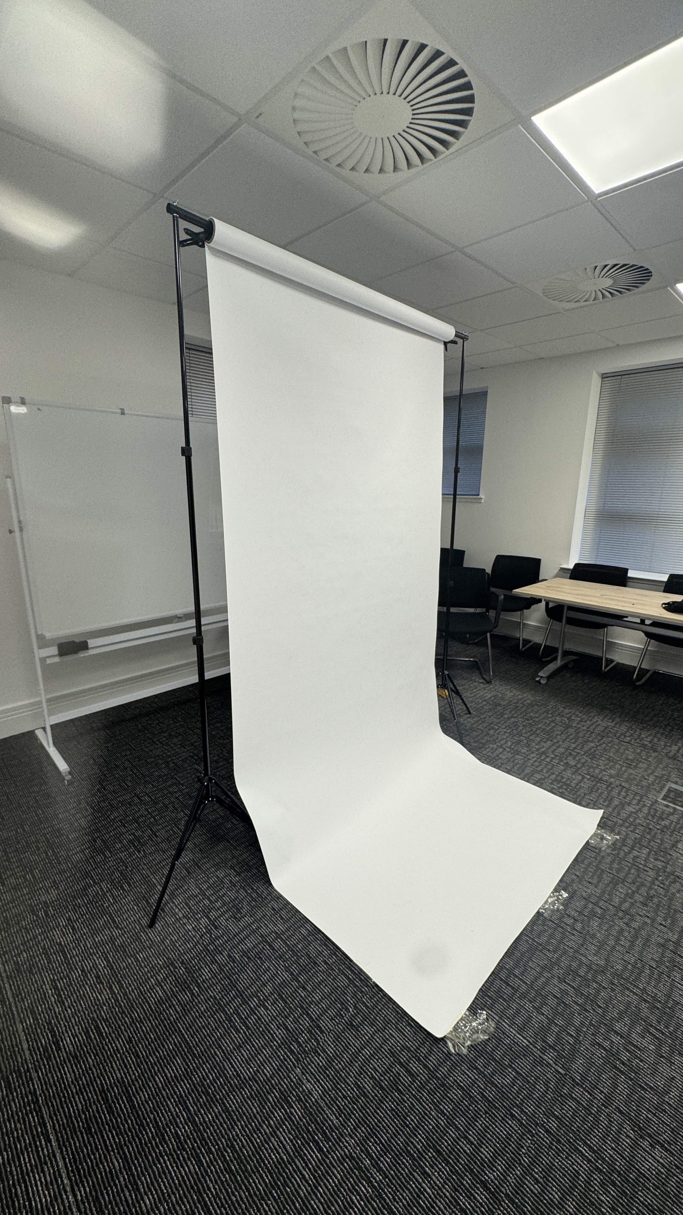 White colorama photography background + studio backdrop support system