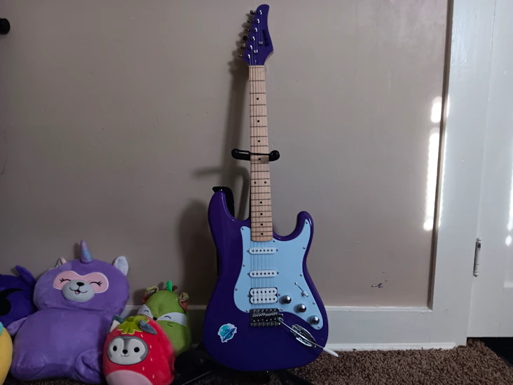 Kay's purple electric guitar